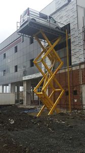 подъемный стол ножницы / гидравлический / для высоких нагрузок / стационарный