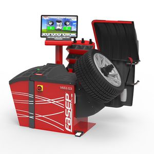 устройство для балансировки колес для легковых автомобилей 1