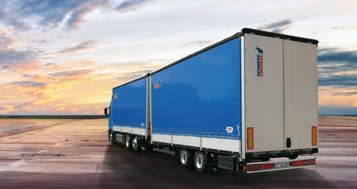 Полуприцеп фургон - Schmitz Cargobull - для окатышей / двухосный / буксируемый