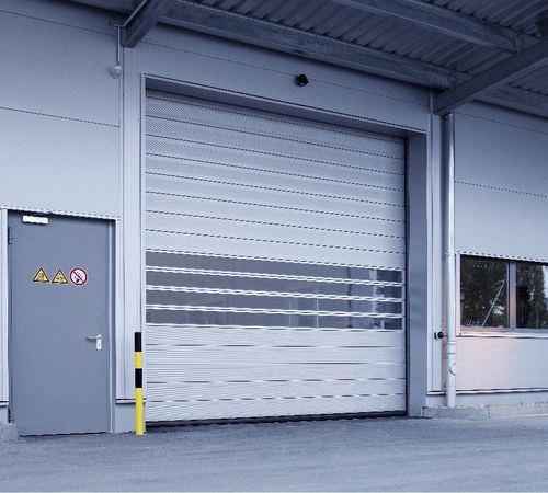 Рулонный ворота - EFA-SST® - EFAFLEX Tor- und Sicherheitssysteme GmbH & Co. KG - со спиральной пружиной / промышленный / для ангара