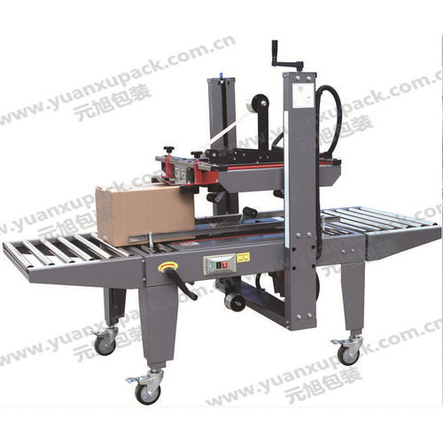 Машина для запечатывания коробок с двойными клапанами - YK-07B - Yuanxu Packing(shanghai) Machinery Co., LTD - клейкая лента / полуавтоматическая