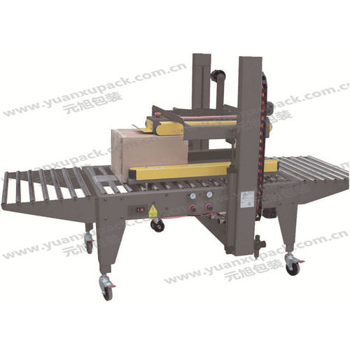 Машина для запечатывания коробок с двойными клапанами - YK-07Q - Yuanxu Packing(shanghai) Machinery Co., LTD - клейкая лента / автоматическая