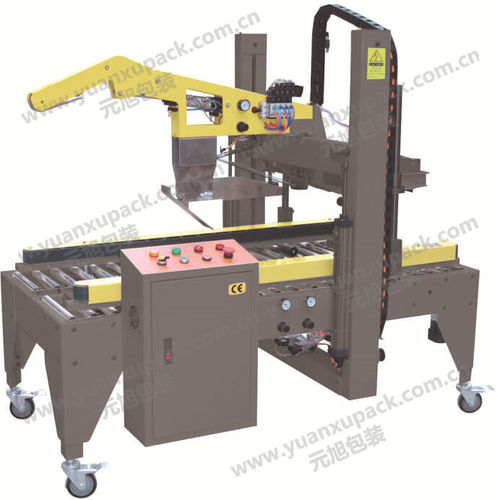 Машина для запечатывания коробок с двойными клапанами - Yuanxu Packing(shanghai) Machinery Co., LTD - клейкая лента / автоматическая