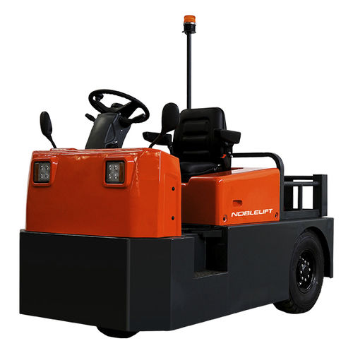 Трактор для буксировки - T60N - Noblelift Intelligent Equipment Co., Ltd. - электрический / 3-колесный / с местом для сидения водителя