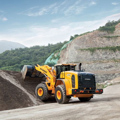 Погрузчик на колесах - HL975 - HYUNDAI HEAYY INDUSTRIES - шарнирный / для строительства / для разгрузочно-погрузочных работ