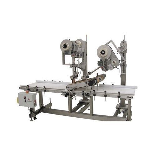 Этикетировочная машина для упаковки - Quadrel Labeling Systems - для наклеивания на верхнюю часть / полусферическая / для сельского хозяйства и пищевой промышленности