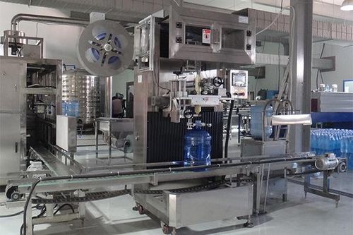 Автоматическая этикетировочная машина - JND-100N - Shenzhen J&D Drinking Water equipment Co Ltd - для бутылок / для короба / с термоусадочной трубкой
