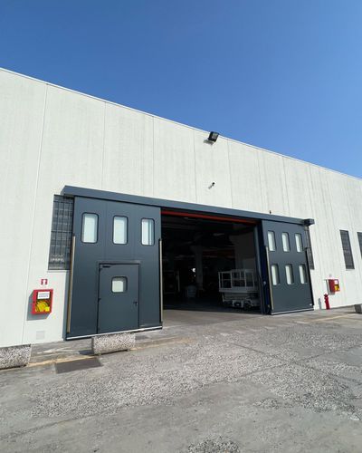 Раздвижной ворота - Moreschi Chiusure Industriali S.r.l. - из гальванизированной стали / для использования в помещениях / изолированный