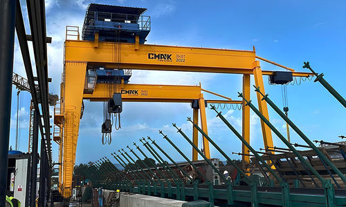 Козловой кран на рейке - CMAK Crane Systems - для контейнера / для сборных строительных площадок / для метро