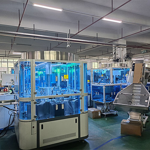 Ротационное устройство закупорки бутылок - Shenzhen xinzhong plastic - пневматическое / с непрерывным движением / моталка