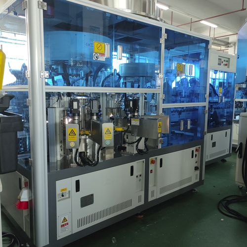 Устройство закупорки бутылок с двойной головкой - SZZ-109SH - Shenzhen xinzhong plastic - с непрерывным движением / с сервоприводом / автоматическое