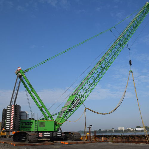 Гусеничный башенный кран - 7700 G - SENNEBOGEN Maschinenfabrik GmbH - со стрелой / решетка / для фасада здания