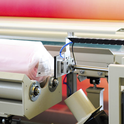Принтер-аппликатор этикеток самоклеящийся - Comatex Textile Machinery - для рулонов ткани / для текстиля