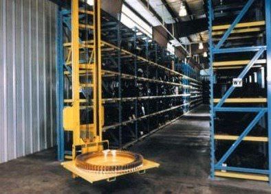 Вертикальная автоматическая система хранения - Stacker - Ridg-U-Rak - для поддонов / автоматизированная складская система