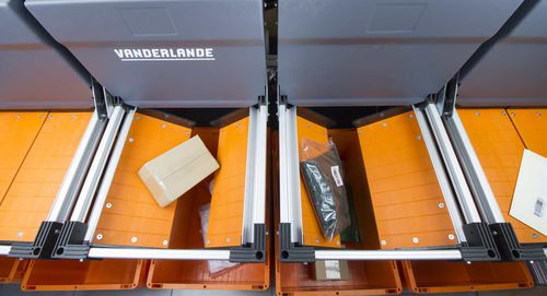 Сортирующее устройство для логистики - TRAYSORTER - VANDERLANDE - автоматическое / для электронного компонента / для посылок