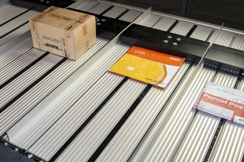 Автоматизированное сортирующее устройство - COMPAXORTER - VANDERLANDE - полуавтоматическое / для посылок / с толкачом