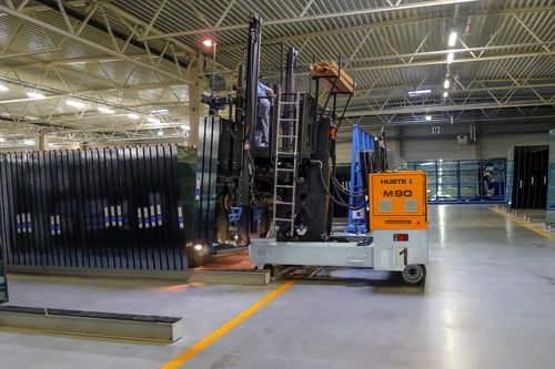 Электрическая боковая подъемная тележка - M 90 - HUBTEX - с местом для сидения водителя / для разгрузочно-погрузочных работ / разнонаправленная