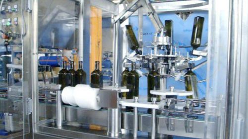 Наполнительно-укупорочная машина для оливкового масла - MFC - PMR System Group - с зажимом / для бутылок / автоматическая