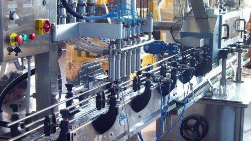 Наполнительно-укупорочная машина для резервуаров из стекла - RT6U JAM - PMR System Group - для питания / для капсулы Twist / автоматическая