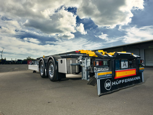 Прицеп контейнеровоз - Hüffermann Transportsysteme GmbH  - строительный / двухосный / буксируемый